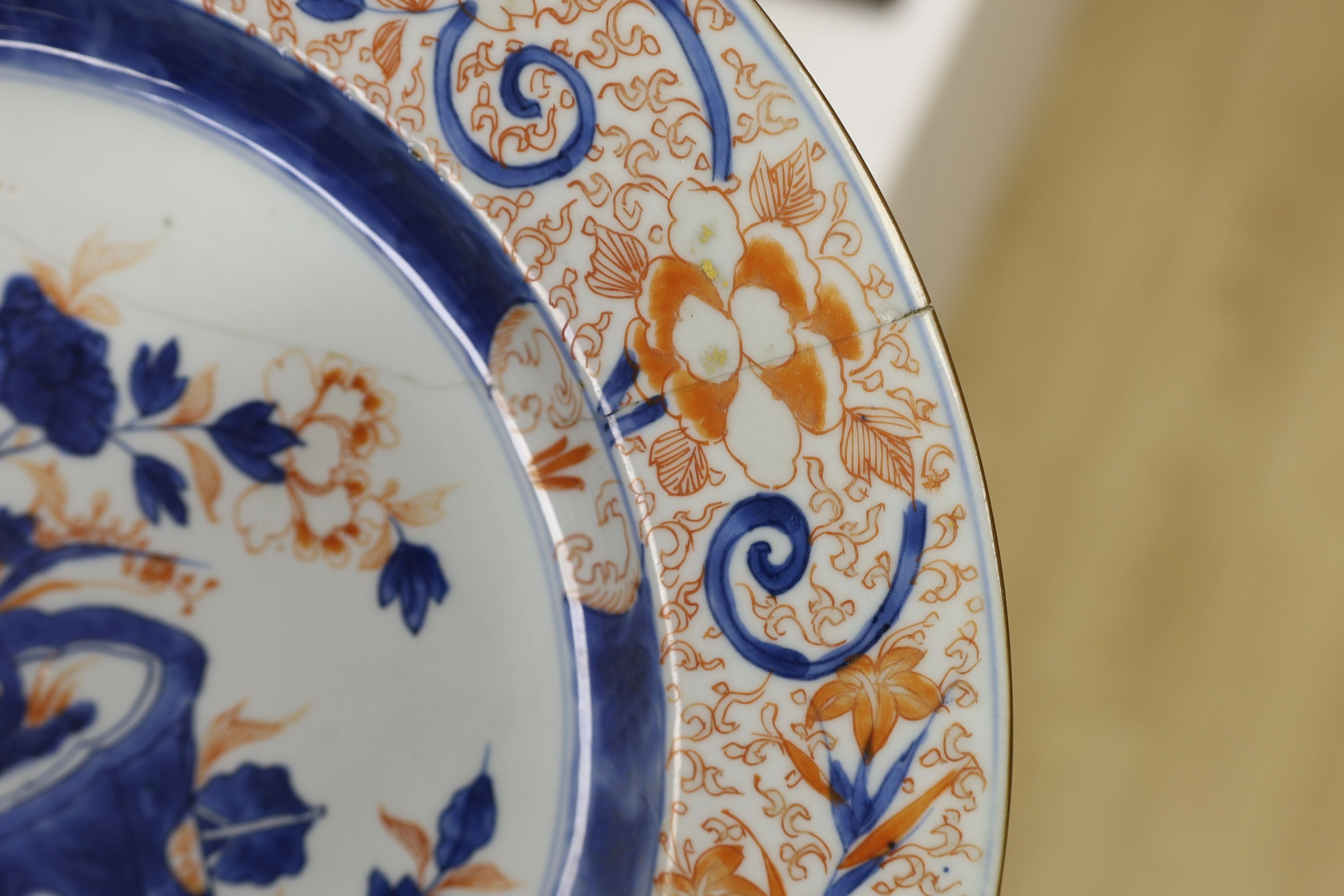 A pair of Chinese Imari dishes, Kangxi period, on wooden stands, 31 cms diameter., Provenance - D.C.Monk & Son, former dealers based in Kensington Church Street, London W8